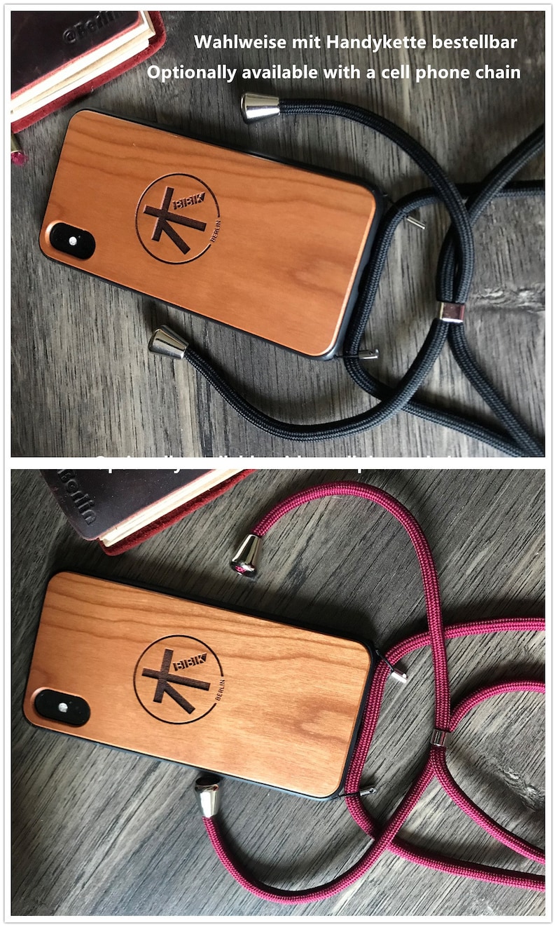 K&ouml;nnte beinhalten: Eine Holz Handyh&uuml;lle mit einer schwarzen und roten Handykette. Die H&uuml;lle hat einen schwarzen Rand und ein Logo mit der Aufschrift "BIBIK BERLIN" mit einem stilisierten Baumdesign. Die Handykette hat silberne Verschl&uuml;sse.