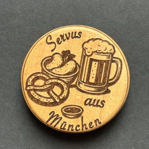 Greetings from Munich – Magnetic bottle opener with pretzel, white sausage and beer mug
