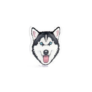 May include: A sticker featuring a cartoon husky dog with blue eyes and a pink tongue sticking out. The dog has black and white fur.