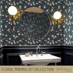 May include: A set of three ceramic mugs with a speckled, matte finish. The mugs are in shades of cream, light gray, and dark gray. Each mug has a simple, minimalist design, perfect for coffee or tea.