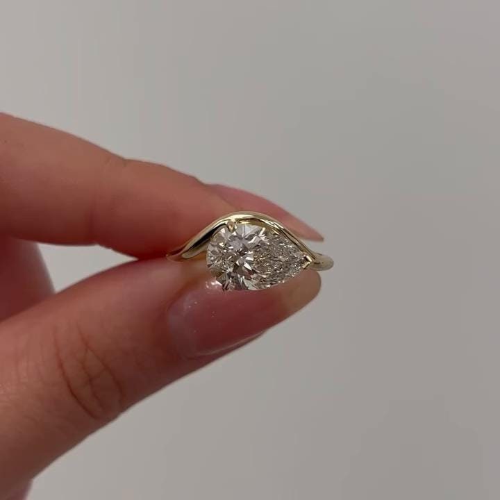 Pear Cut Moissanite Curved Proposal Ring For Her, East West Pear Solitaire Wedding Ring, Solid Gold Engagement Ring, Forever Teardrop Ring
