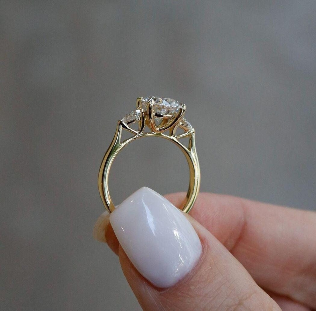 Trellis three stone engagement ring discount