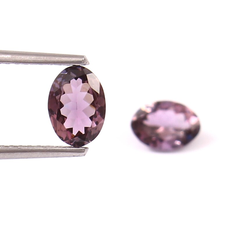 1.40 carats total, shown under natural light for custom earring making.