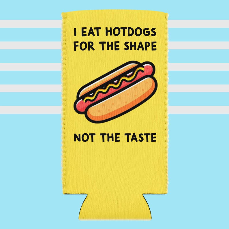 May include: Yellow beverage insulator with a cartoon hotdog illustration. The text reads "I EAT HOTDOGS FOR THE SHAPE NOT THE TASTE" in black capital letters. The background is blue and white striped.