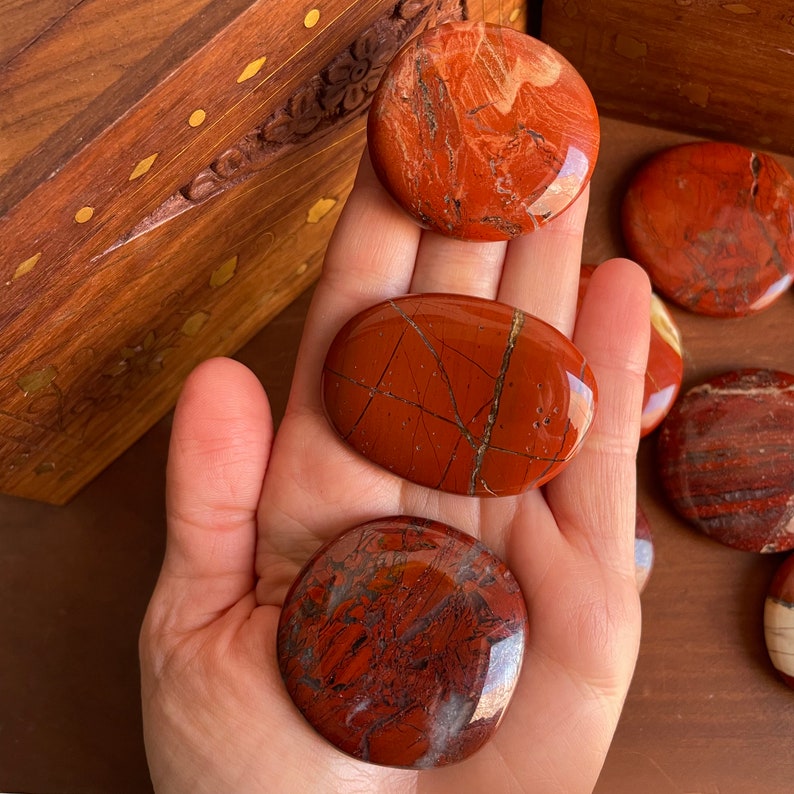 Smooth Red Jasper Worry Stone - A tactile companion for stress relief.