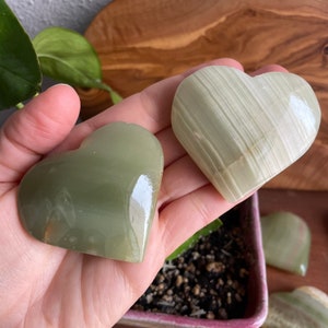 Connect with the energies of Gemini and Virgo through our Green Onyx Heart. This image captures the crystal's alignment with these signs of self-discovery and healing.