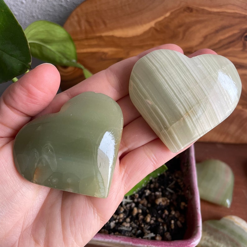Connect with the energies of Gemini and Virgo through our Green Onyx Heart. This image captures the crystal's alignment with these signs of self-discovery and healing.