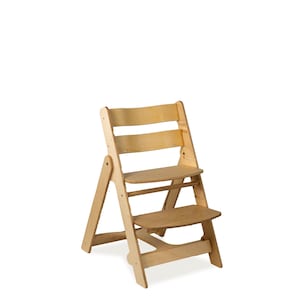 May include: A wooden high chair with a natural finish. The chair has a stepped design with a seat and footrest. The backrest has three horizontal slats. The chair is designed for children and is made of light-colored wood.