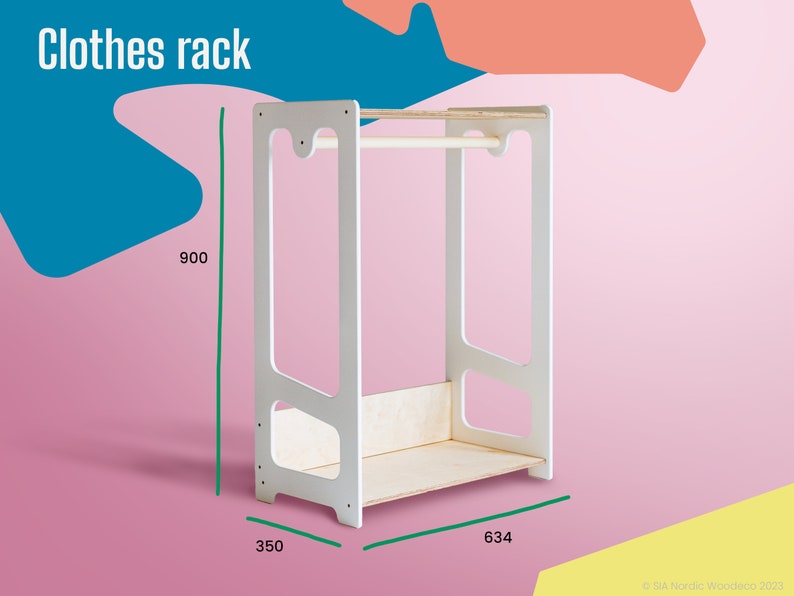 May include: White clothes rack with a wooden bar and a shelf. The rack is 35 inches wide, 63.4 inches tall, and 900 millimeters high.