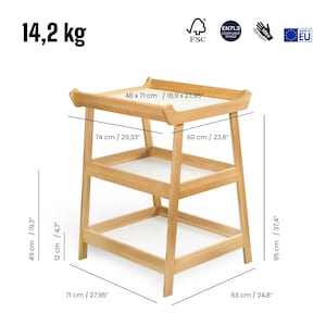 May include: A light-coloured wooden changing table with three levels. The top surface measures 48 x 71 cm, and the table is 95 cm tall. The table weighs 14.2 kg. The image includes the text "FSC", "EN71.3 COMPLIANT RANGE", and "MADE IN EU".