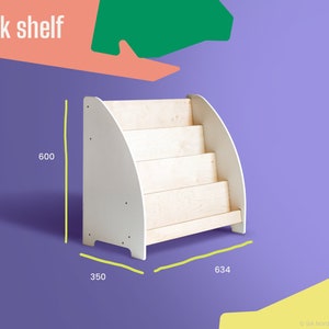 May include: White wooden bookshelf with five shelves. The bookshelf is 23.6 inches wide, 25 inches tall, and 14 inches deep.