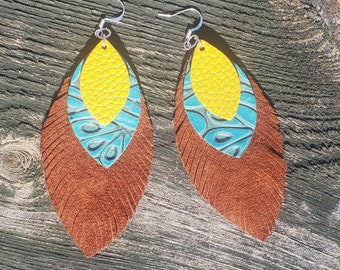 Handmade leather, stacked & fringed earrings.