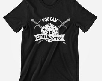 May include: Black t-shirt with a white graphic of a 20-sided die with crossed swords and the text "You Can Certainly Try".