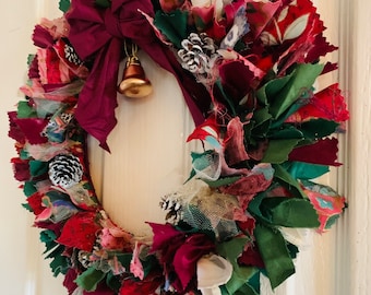 DIY Christmas rag wreath. Red, gold and green with vintage patterned fabric, gold bells and big bow. Easy to do.