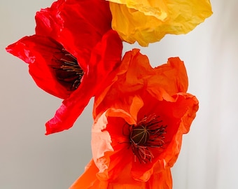 Set of 3 oversized handcrafted wired  Crepe Paper Flowers on stems in 4 different size ranges and custom colours.  Event decoration.