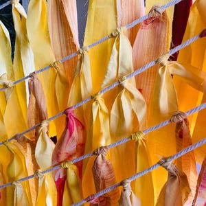 Sunshine Glamping Bunting, Tassel Garland Decor for Boho Chic Outdoor Parties. Sold by the metre. Tones of yellows.