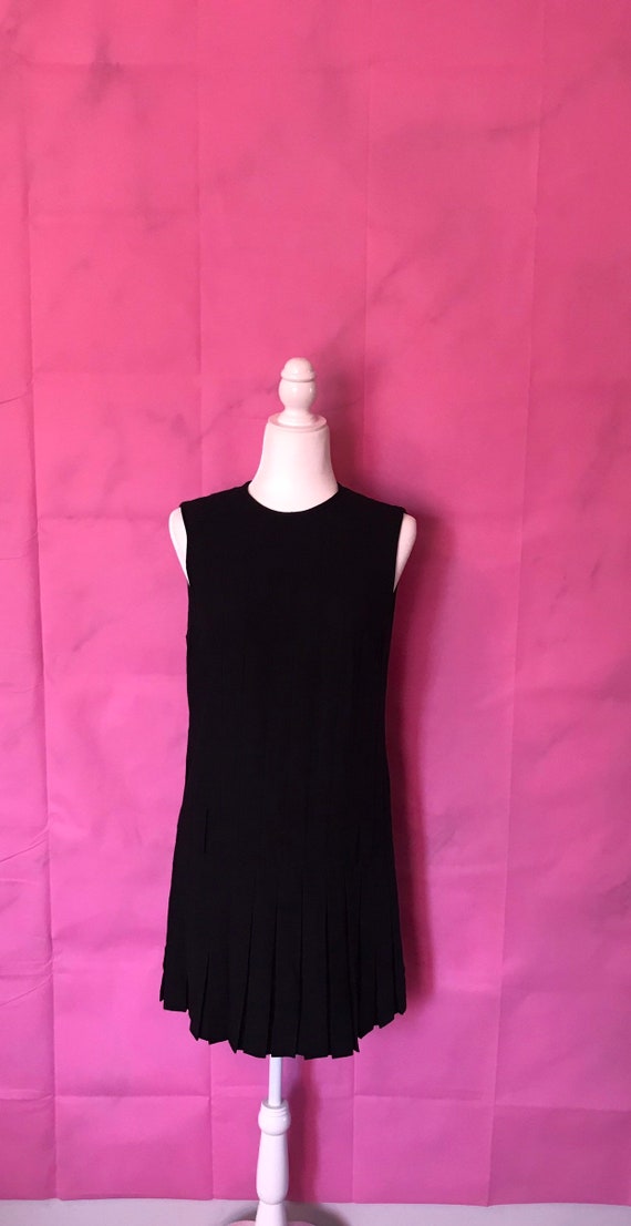 black pleated mini dress