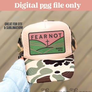 May include: A trucker hat with a tan front panel and a camouflage print on the bill and mesh back. The front panel features a rectangular patch with the words "FEAR NOT" above a cross and the text "ISAIAH 41:10". The hat is a digital png file.