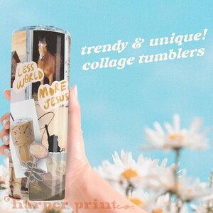May include: A stainless steel tumbler with a collage design featuring a horse, a cup of coffee, and text that says "Less World More Jesus". The tumbler is held in a hand against a blue sky background with white daisies.