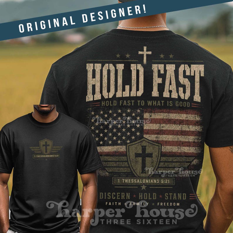 May include: Black t-shirt with a distressed American flag design and the words "HOLD FAST" in a bold font. The shirt also features a cross and the text "1 Thessalonians 5:21". The design includes the words "DISCERN HOLD STAND" and "FAITH FAMILY FREEDOM".
