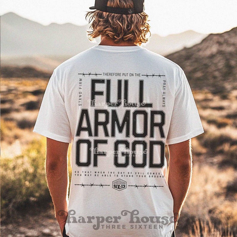 Peut inclure: T-shirt blanc avec du texte noir qui dit "Stand Firm", "Therefore Put On The Full Armor Of God", "Pray Always", "So That When The Day Of Evil Comes You May Be Able To Stand Your Ground", "Six:13", et "Harper House Three Sixteen".