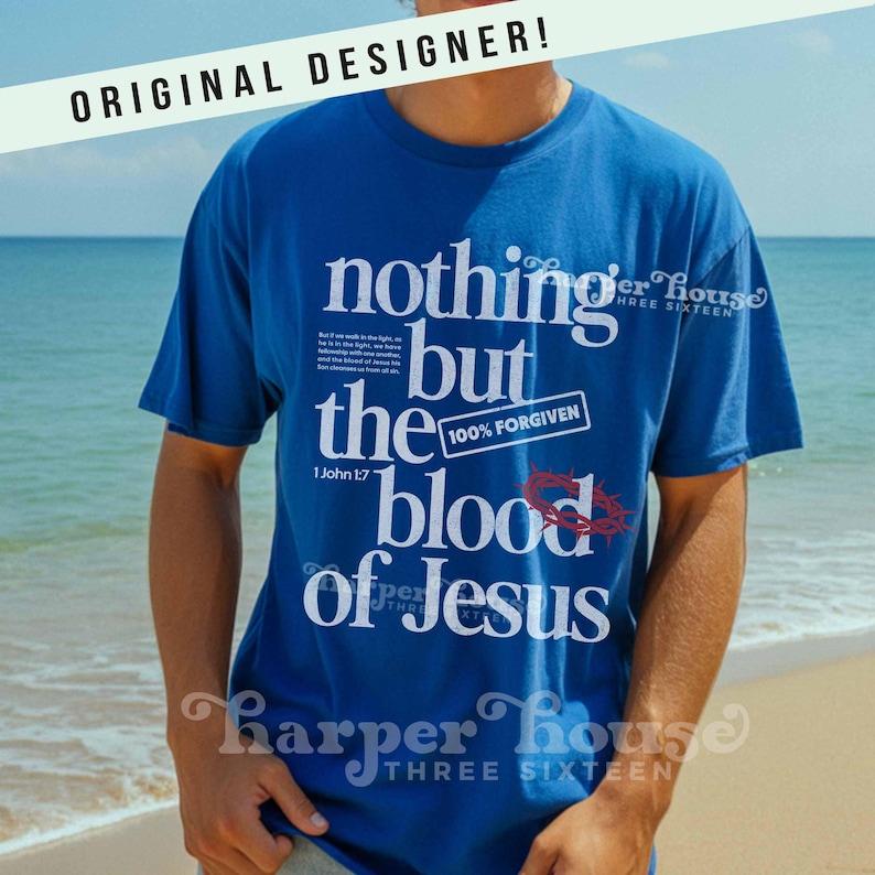 May include: A royal blue t-shirt with the text "nothing but the blood of Jesus" in white. The design includes a red crown of thorns and the text "100% FORGIVEN". The shirt also features the text "1 John 1:7" and "Harper House Three Sixteen".