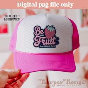 May include: A pink and white trucker hat with the text "Be the Fruit" and a strawberry graphic. The hat also features the text "GALATIANS 5:22". The top of the hat has a white panel with a zig-zag pattern. The image also includes the text "Digital png file only" and "GREAT FOR DTF & SUBLIMATION!"
