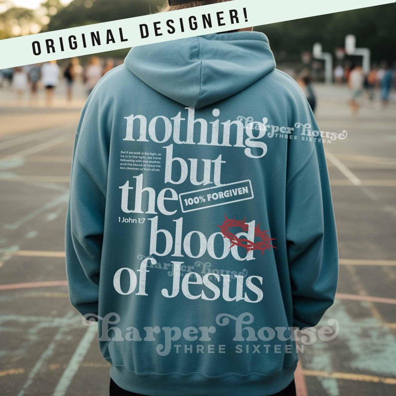 May include: A teal hoodie with the text "nothing but the blood of Jesus" in white. The phrase "100% FORGIVEN" is also visible. The hoodie has a hood and long sleeves. The words "ORIGINAL DESIGNER!" are at the top.