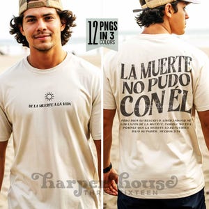 May include: A beige short-sleeve t-shirt featuring a small sun icon and the text DE LA MUERTE A LA VIDA on the front. The back displays the large text LA MUERTE NO PUDO CON ÉL and a passage from Hechos 2:24 in black lettering.
