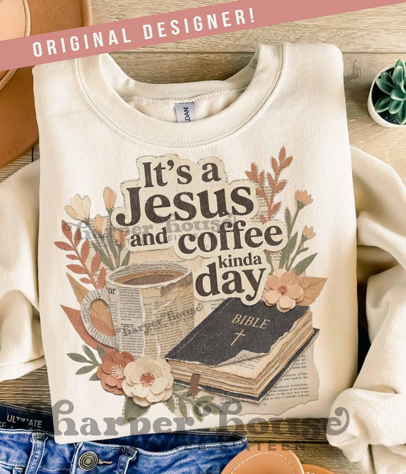 May include: Cream-colored sweatshirt with the text "It's a Jesus and coffee kinda day" and a graphic of a coffee cup, Bible, and floral accents. The words "ORIGINAL DESIGNER!" are printed at the top.