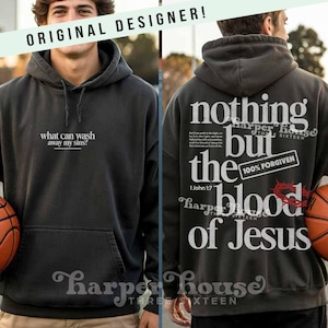 May include: Charcoal gray hoodie with the text "what can wash away my sins?" on the front. The back features the words "nothing but the blood of Jesus" with a crown of thorns graphic. The hoodie also has the text "100% FORGIVEN".