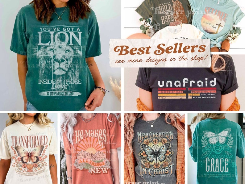 May include: A collection of t-shirts with various Christian-themed designs. The designs include a lion, a butterfly, a sunset, and a cross. The text on the shirts includes "You've got a lion", "Transformed", "He makes all things new", "New creation in Christ", and "Amazing Grace".