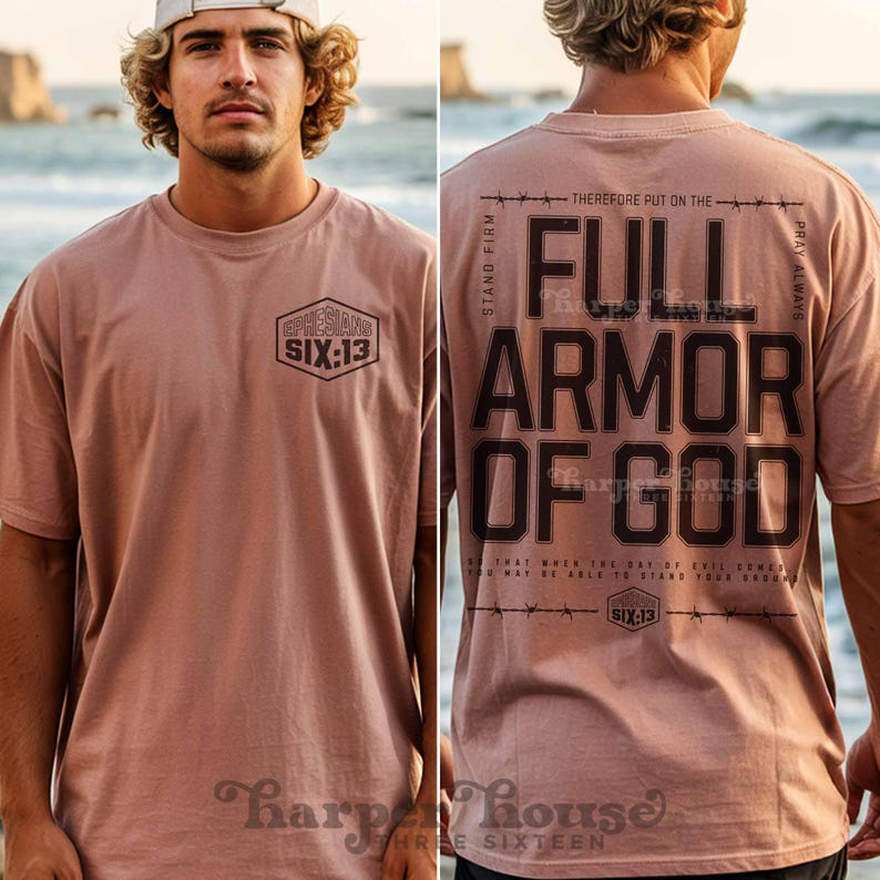 Peut inclure: Un t-shirt rose p&acirc;le avec le texte "Full Armor of God" imprim&eacute; au dos. Le devant du t-shirt porte l'inscription "Ephesians Six:13".