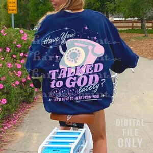 May include: A navy blue sweatshirt with a pink and white vintage phone graphic and the text "Have You Talked to God? Lately? He'd Love to Hear From You!"