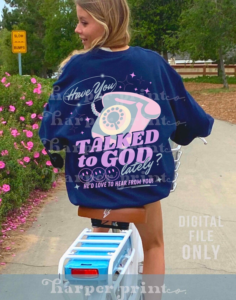 May include: A navy blue sweatshirt with a pink and white vintage phone graphic and the text "Have You Talked to God? Lately? He'd Love to Hear From You!"
