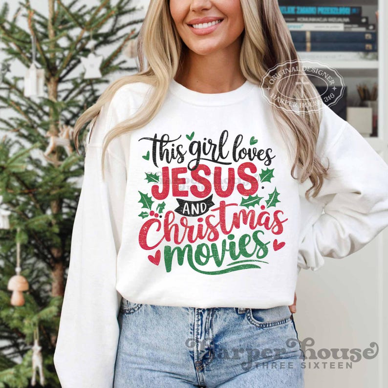 May include: White sweatshirt with a red and green graphic that says "This girl loves Jesus and Christmas movies".