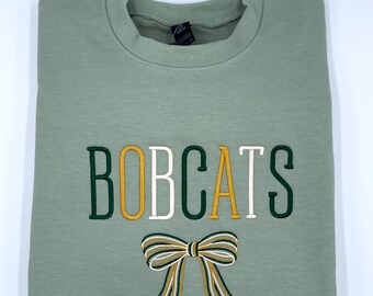 Sudadera con cuello redondo o capucha con lazo bordado de los Bobcats, suéter con mascota, ropa escolar de estilo coqueto.