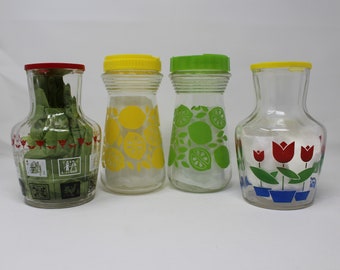 Assorted Juice Carafes/Decanters with Lids, Sold Separately.