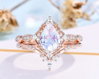 Vintage pear cut moonstone engagement ring set rose gold milgrain ring unique round cut moissanite ring curved band anniversary bridal set