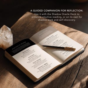 May include: An open journal with the text "A Guided Companion for Reflection" and "Reflections of the Heart". A pen rests on the pages. The journal is on a wooden surface, with a crystal in the background.