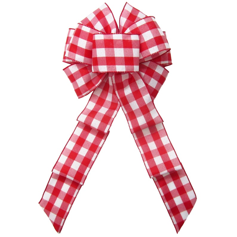 May include: A red and white gingham bow with a large center loop and two long tails.