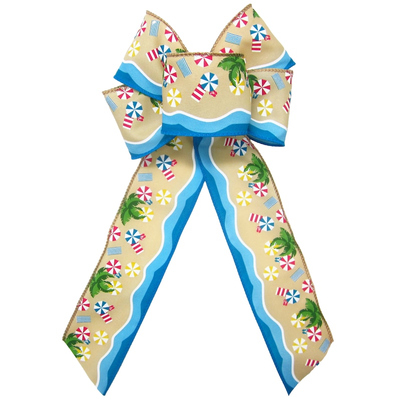 May include: A large, beige bow with a blue and white beach scene pattern. The pattern includes palm trees, umbrellas, and waves.
