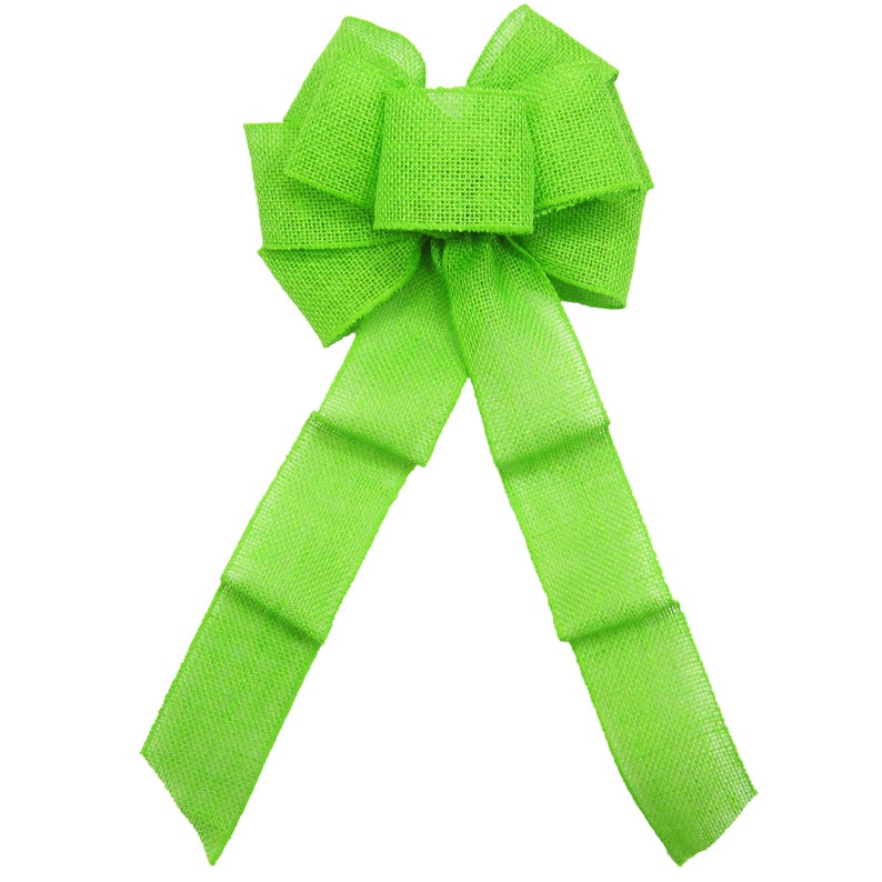 May include: A large, bright green burlap bow with a center loop and long tails. The bow is made of a textured fabric and is perfect for adding a touch of color and whimsy to any decor.