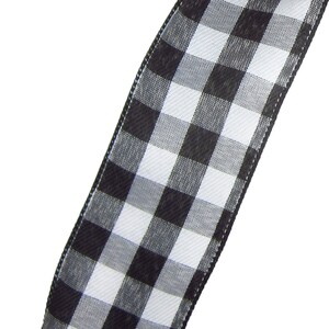 May include: Black and white checkered ribbon with a satin finish. The ribbon is approximately 2.5 inches wide.