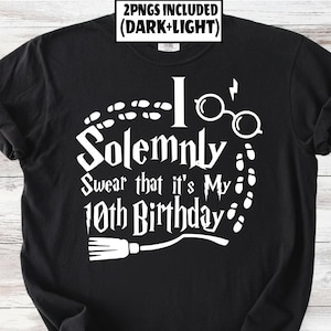 May include: Black t-shirt with white text that reads "I Solemnly Swear that it's My 10th Birthday." The design includes glasses, a lightning bolt, footprints, and a broom. The top of the shirt has the text "2PNGS INCLUDED (DARK+LIGHT)".