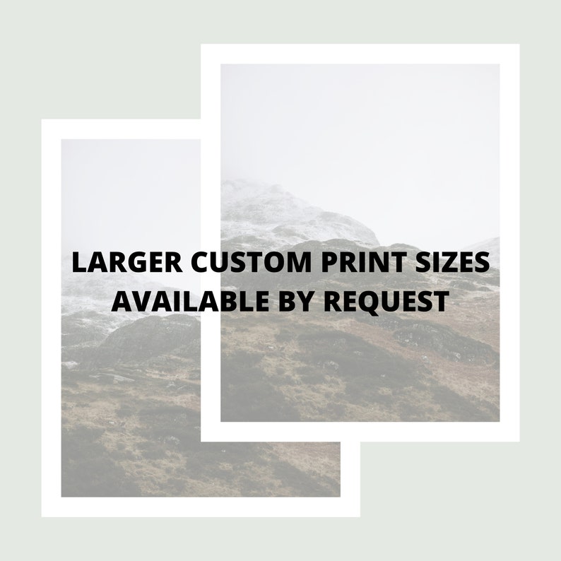 May include: A photograph of a mountain range with a white, snowy peak. The image is framed with a white border and the text "LARGER CUSTOM PRINT SIZES AVAILABLE BY REQUEST" is superimposed on the image.