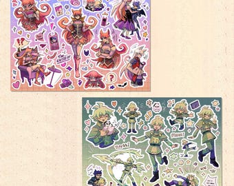 Puede incluir: Dos hojas de pegatinas con personajes de dibujos animados coloridos. La primera hoja presenta personajes con acentos rosa, rojo y morado. La segunda hoja presenta personajes con acentos verde y amarillo. El texto "Too cute!!" y "Hiya!" está incluido en las pegatinas.