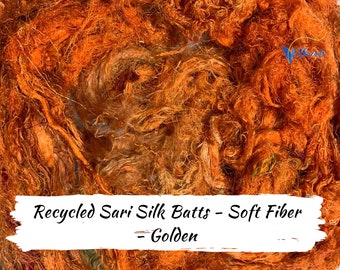 Residuos de seda sari dorados: fibra suave reciclada