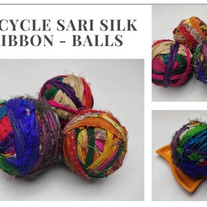 Several colorful sari silk ribbon balls with contrasting blue, yellow and red strips