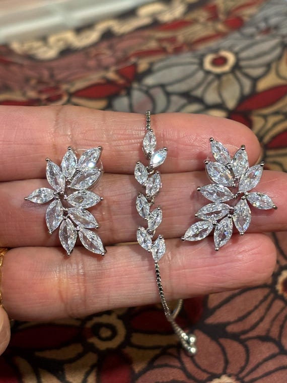 Silvertone and sparkling set of clear rhinestone … - image 1